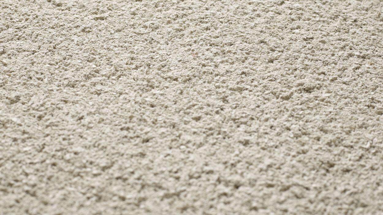 Close-up of Acosorb acoustic spray in Indian Yellow texture